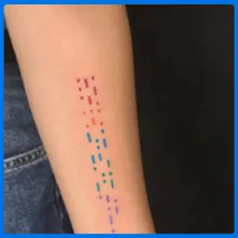 colorfull morse tattoo in arm
