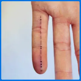 morse code tattoo in finger