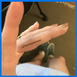 morse tattoo in middle finger
