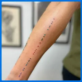 beautiful code tattoo in arm